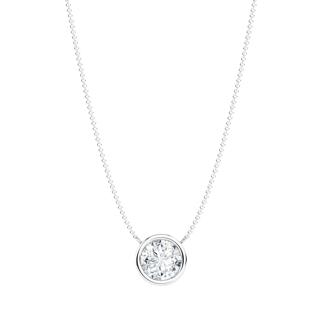 Lab-grown diamond solitaire necklace with round bezel pendant on silver chain, black background