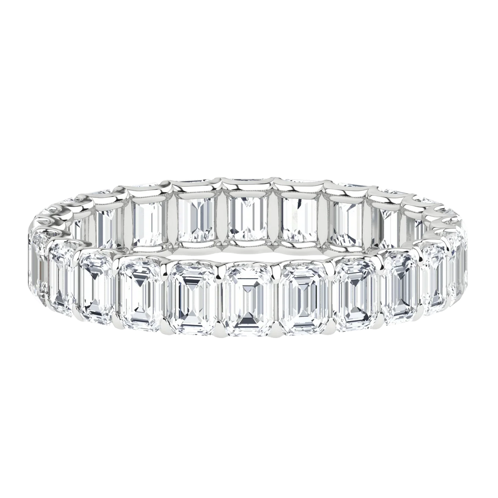 Emerald cut lab-grown diamond eternity band in white gold on black background