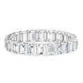 Emerald cut lab-grown diamond eternity band in white gold on black background