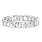 Emerald cut lab-grown diamond eternity band in white gold on black background