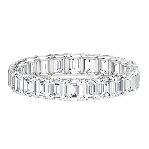 Emerald cut lab-grown diamond eternity band in white gold on black background