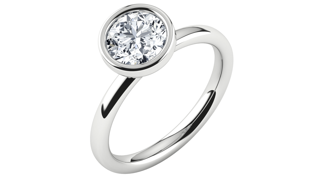 Solitaire lab-grown diamond ring with bezel setting on polished white gold band