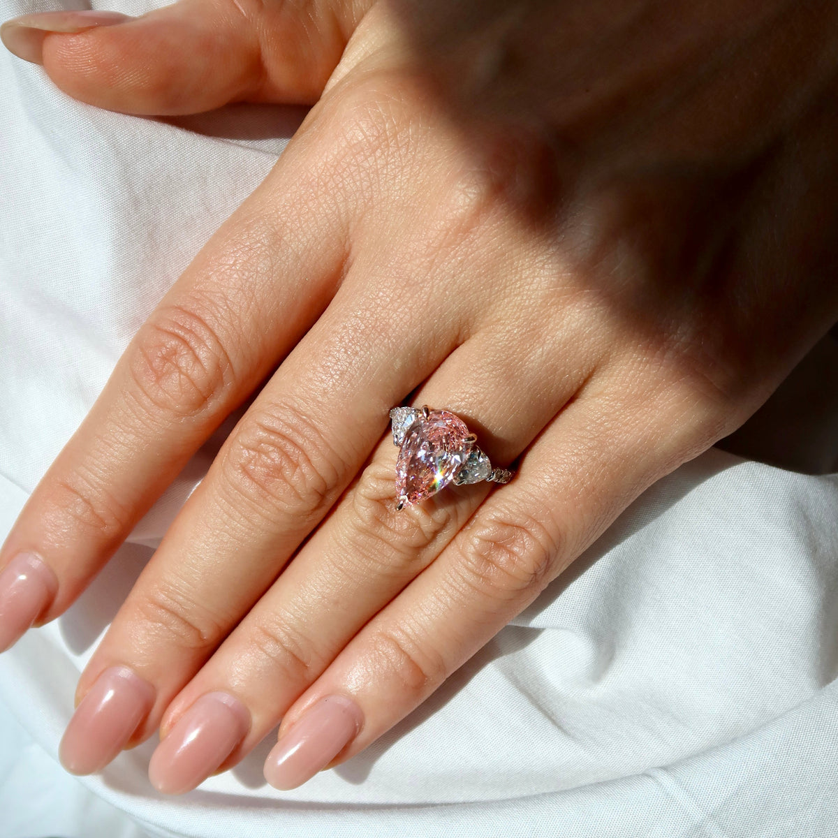 4.02 Ct Fancy vivid Pink Rose Pear shape lab grown diamond ring with side diamonds