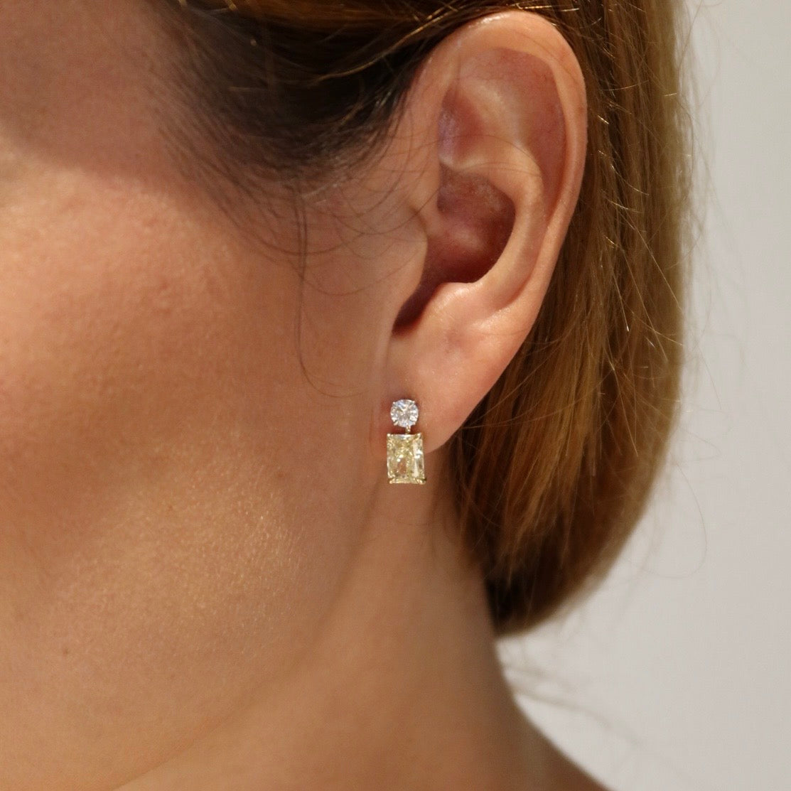 1.50 Ct each Fancy Yellow Radiant Earrings with Round Diamonds