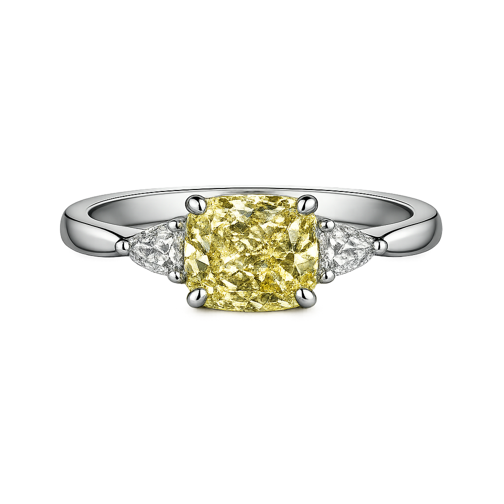 Cushion cut yellow lab-grown diamond ring with white side stones on platinum band