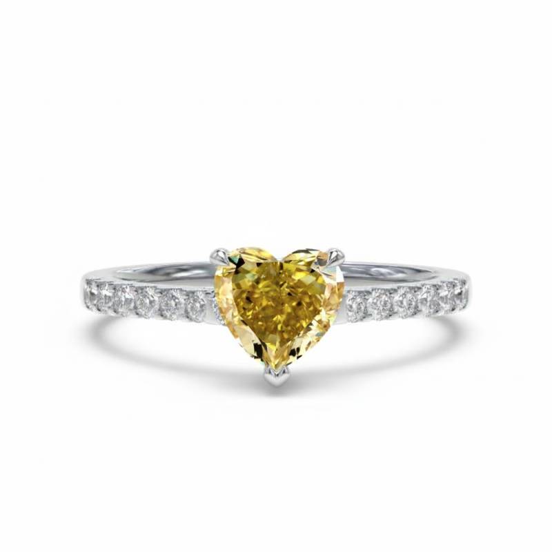 Heart-shaped yellow diamond ring with diamond-studded white gold band