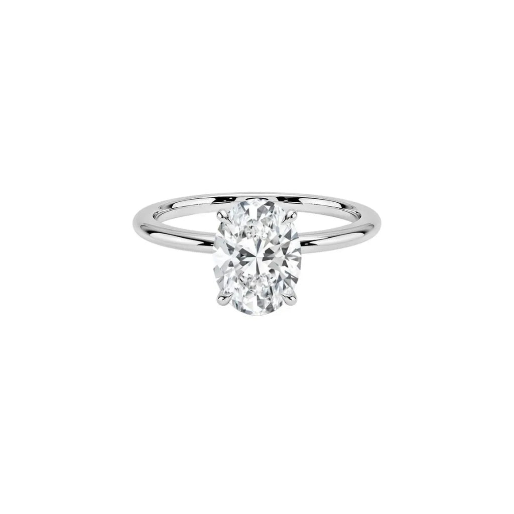 Oval cut lab-grown diamond solitaire engagement ring on minimalist white gold band