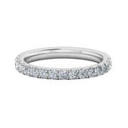Elegant lab-grown diamond eternity band in white gold with brilliant round stones