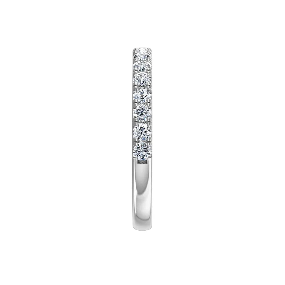 Lab-grown diamond eternity ring in white gold, minimalist band design on white background