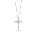 Lab-grown diamond cross pendant necklace on a silver chain, isolated on white background.