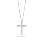 Lab-grown diamond cross pendant necklace on a silver chain, isolated on white background.