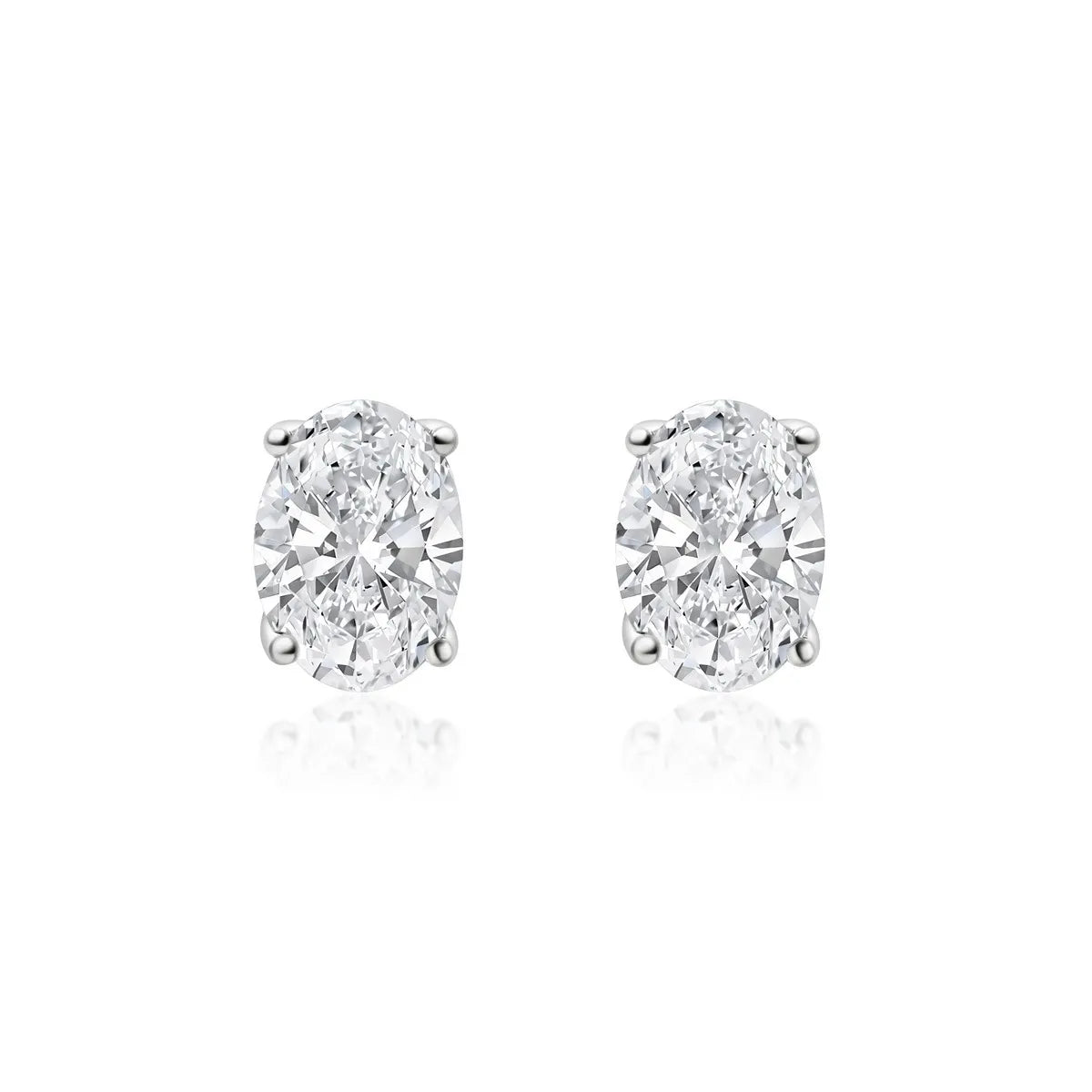 Oval cut lab-grown diamond stud earrings on white background