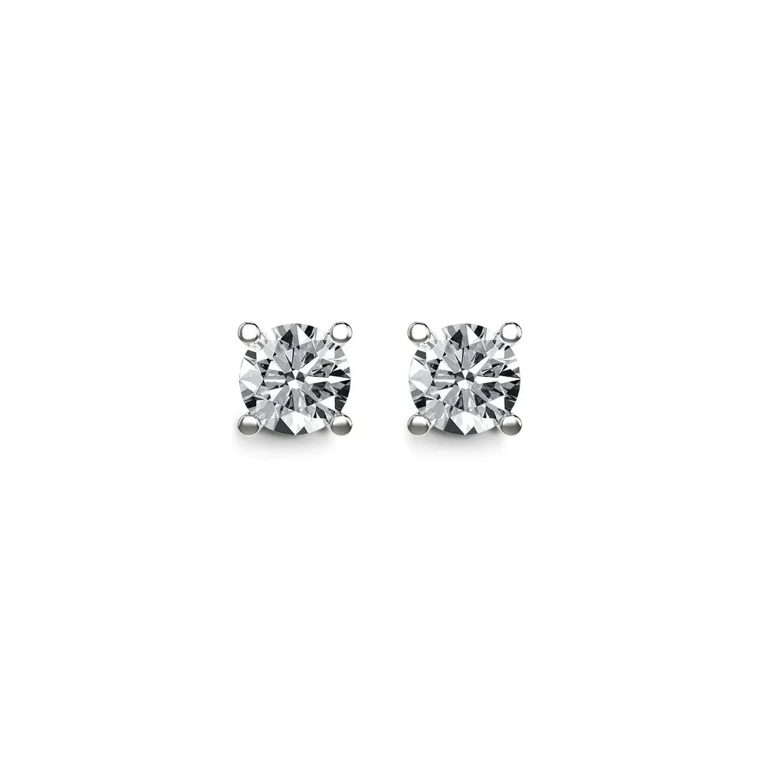 Round lab-grown diamond stud earrings with four-prong white gold settings on white background