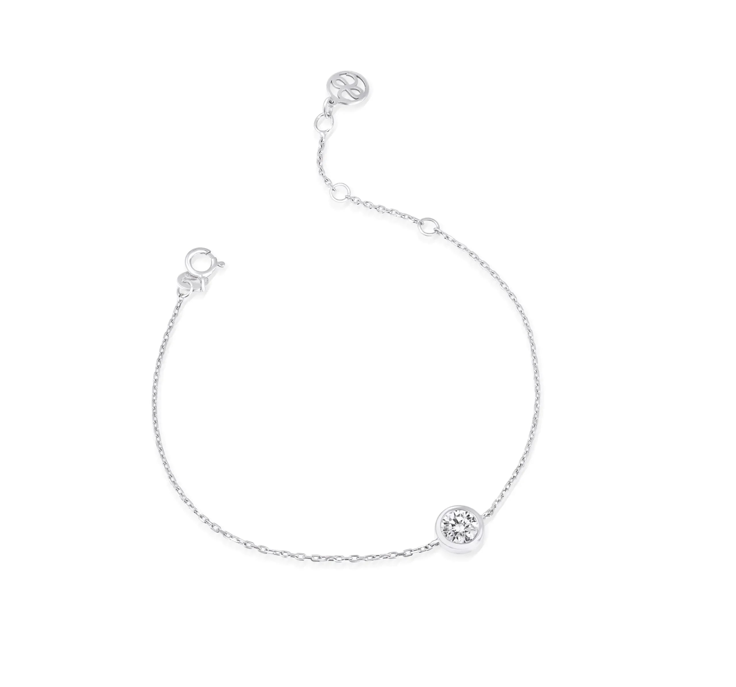 Minimalist lab-grown diamond bracelet with silver chain on white background