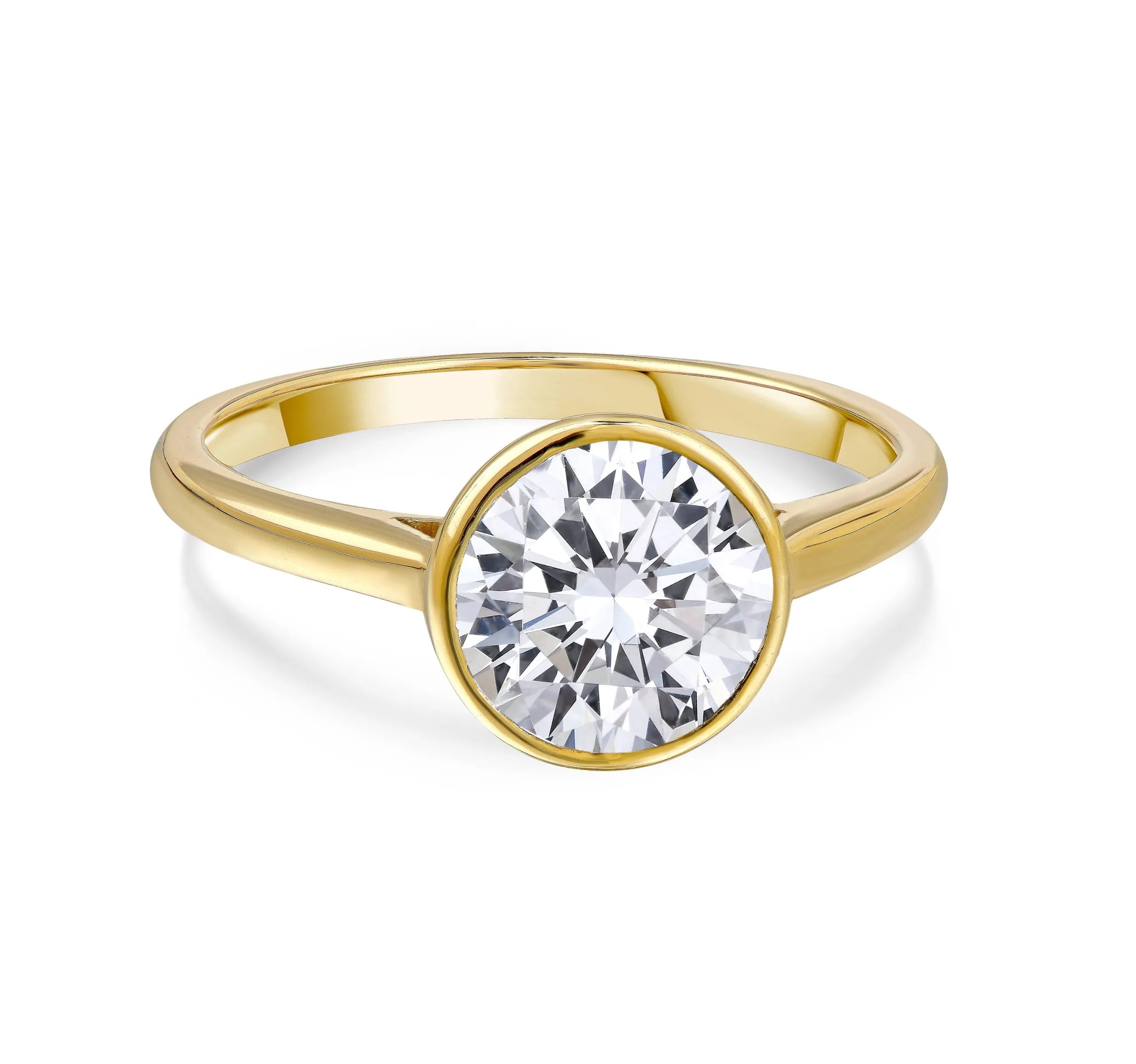 Gold ring with large round lab-grown diamond solitaire on white background