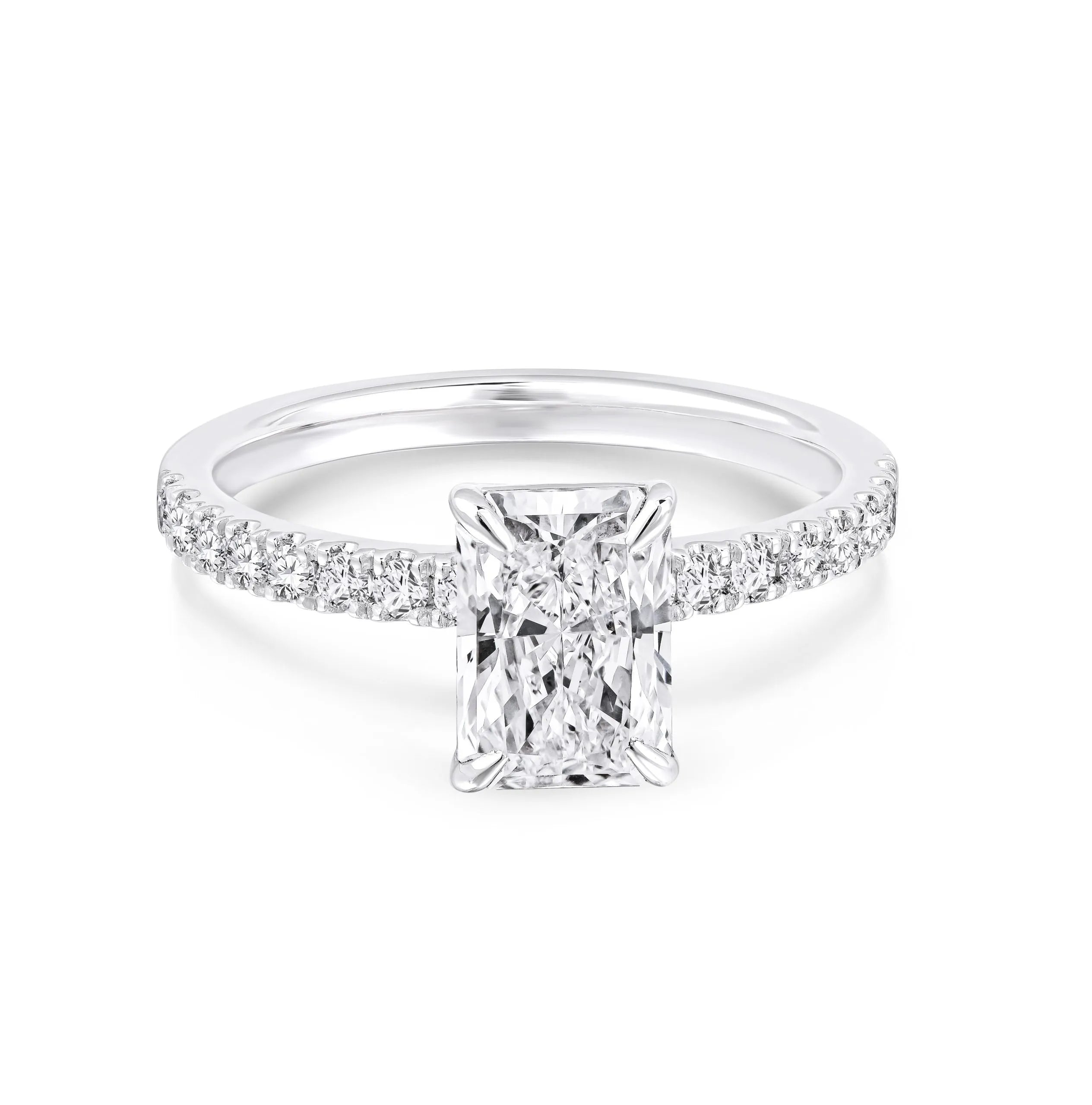 Radiant cut lab-grown diamond ring with pavé band on white background