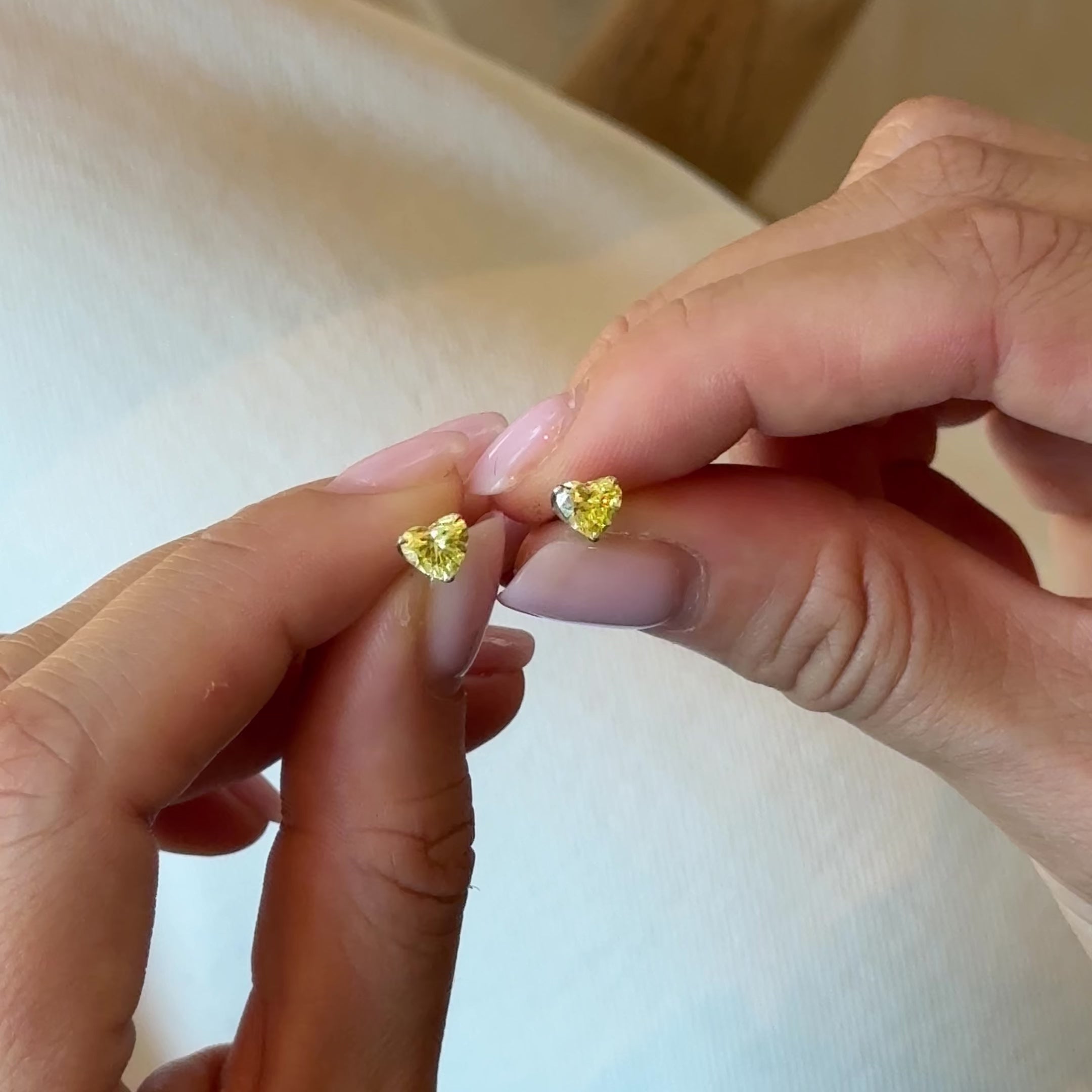 0.5 ct each Fancy Yellow Heart stud Earrings