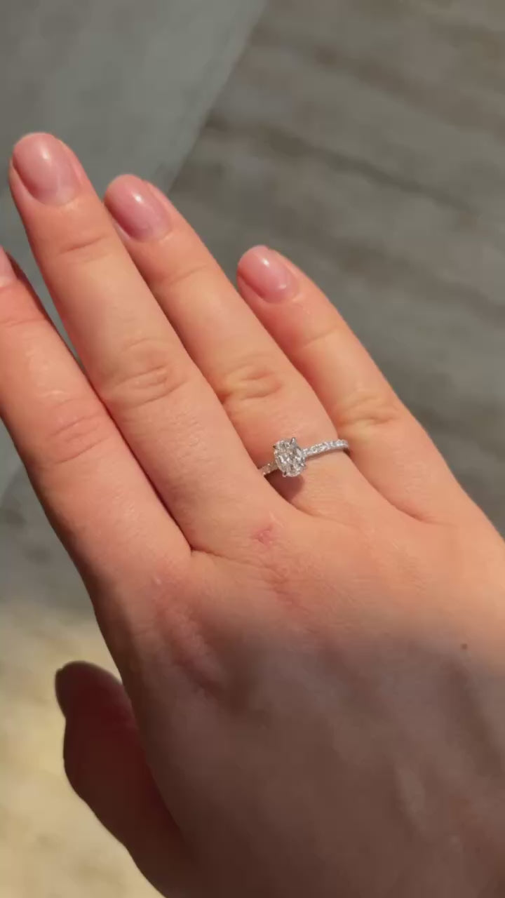 0.70 Ct Oval Natural Diamond Ring with 0.28 cttw Side Diamonds