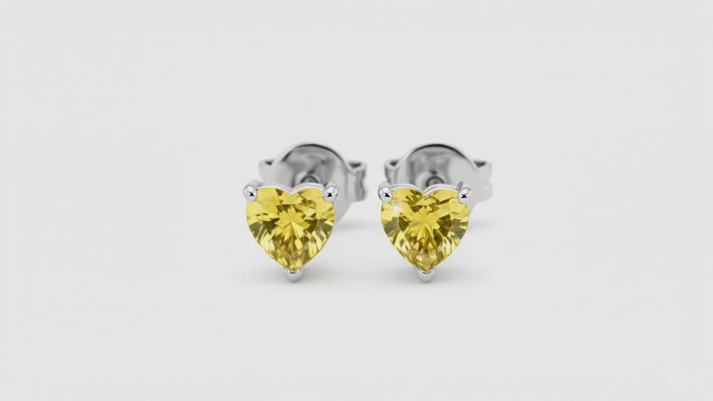 0.5 ct each Fancy Yellow Heart stud Earrings