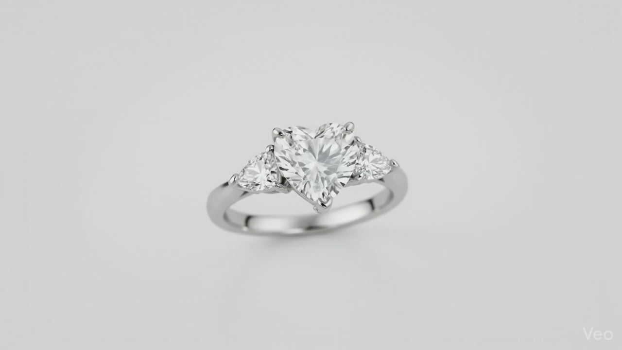3.09 ct Heart Ring with side Diamonds